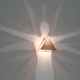 Illustration for article titled Gorgeous Shadow Art Emerges From These Mundane Metal Boxes